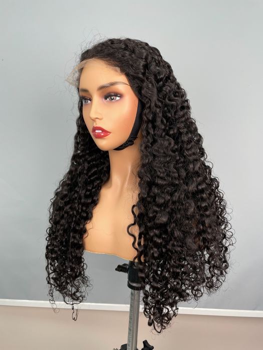 Burmese curly custom lace wig on a mannequin head